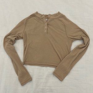 Cropped tan long sleeve top
